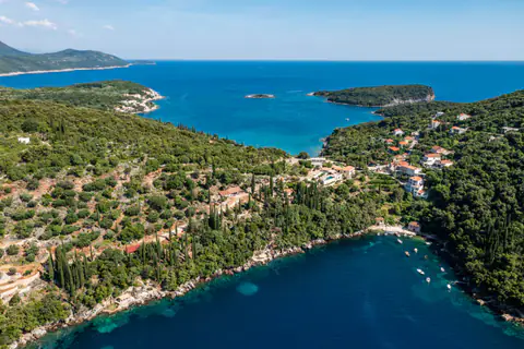 Rocky shore and swimming platform reached directly from the estate.